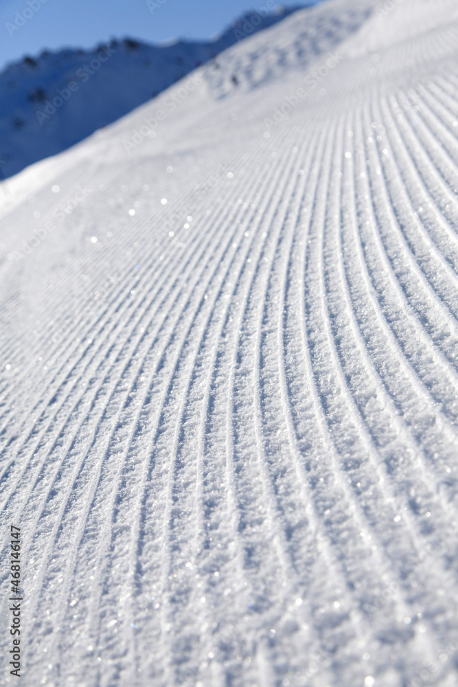 piste de ski trace dameuse neige