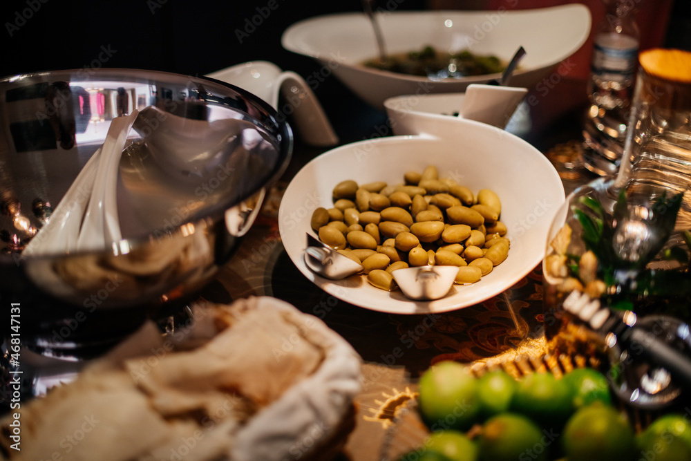 festive table in focus plate with olives