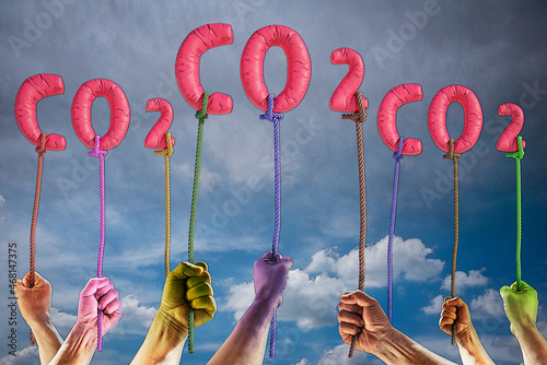 Color Hands Holding Co2 Balloons concept for Air Pollution