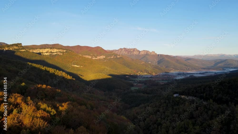 Aerial scene with drone of the autumn landscape in La Vall D En Bas, La Garrotxa, Girona, Spain. 4K UHD