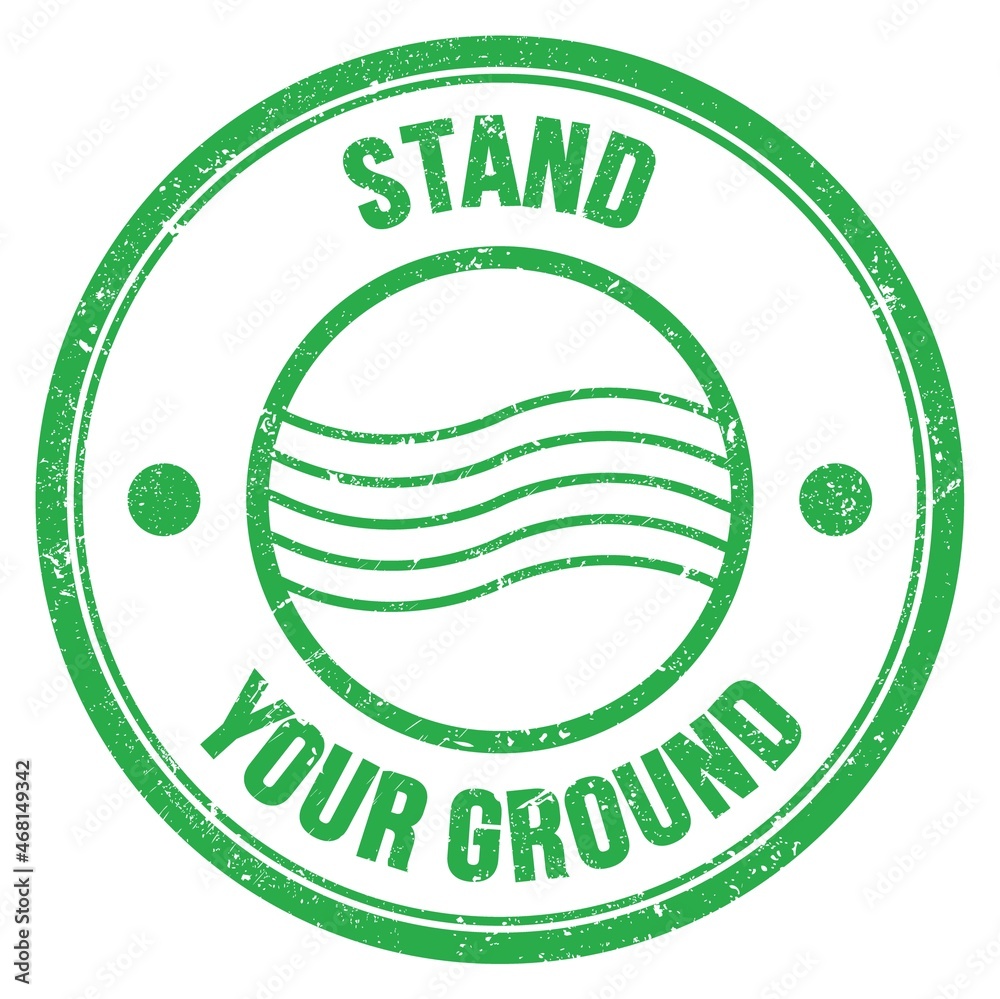STAND YOUR GROUND text on green round postal stamp sign STAND YOUR GROUND text on green round postal stamp sign