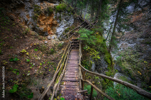 Devil's Path - picturesque eco-path and hiking trail in the Rhodopes mountains, Bulgaria. Wooden  bridge at autumn photo