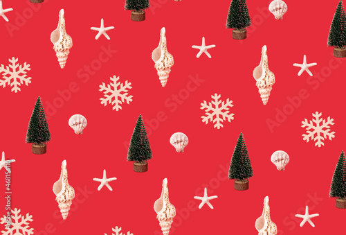 Wallpaper Mural Seashells, snowflake and Chistmas tree on red background. Minimal xmas or new year sea pattern. Torontodigital.ca