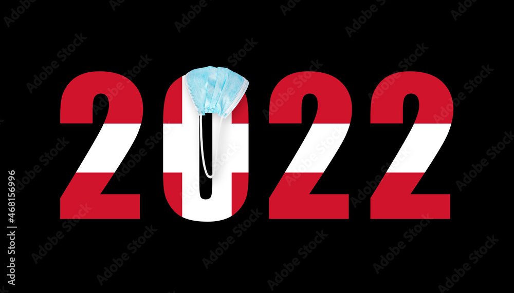 2022 with flag of Denmark and medical mask for protection against covid on black background 2022 with flag of Denmark and medical mask for protection against covid on black background