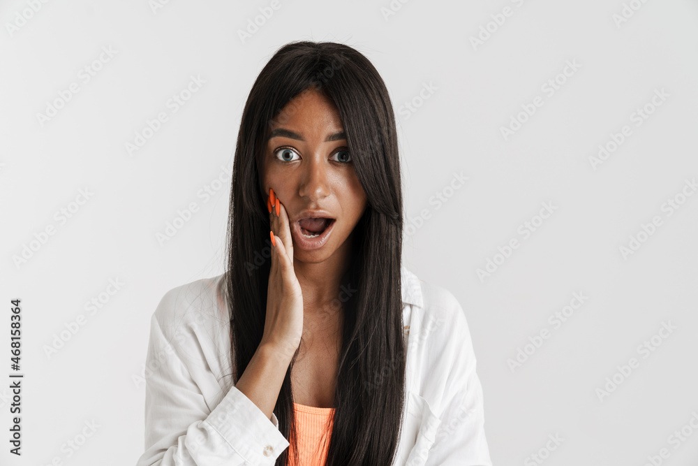 Smiling young african woman with long dark hair Smiling young african woman with long dark hair