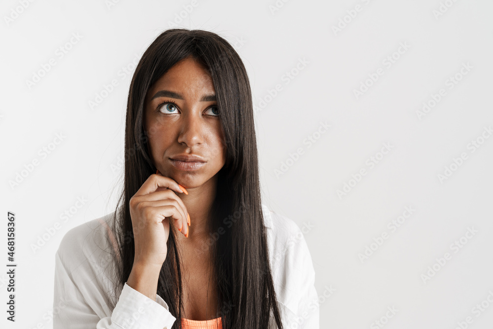 Smiling young african woman with long dark hair Smiling young african woman with long dark hair
