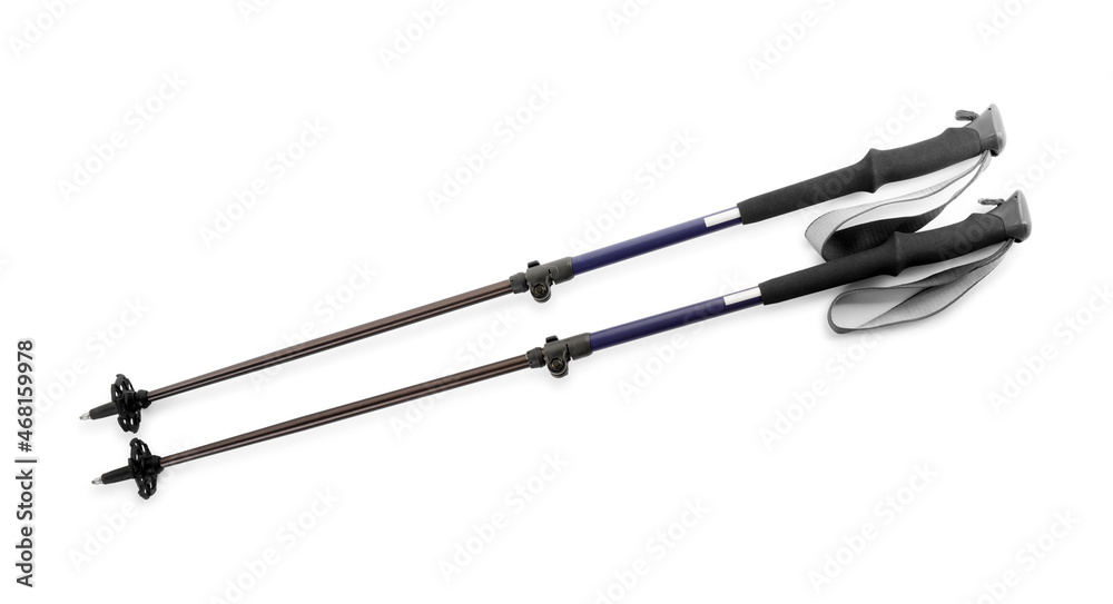 Pair of trekking poles on white background, top view. Camping tourism Pair of trekking poles on white background, top view. Camping tourism
