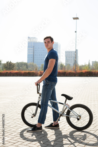 Young urban bmx racer in the city