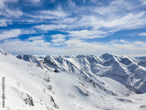 snow covered mountains, viewpoint from Buteanu Peak, Fagaras Mountains, Romania 