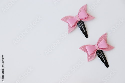 Pink baby hairpins in the form of bows