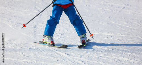 A man is skiing in the snow