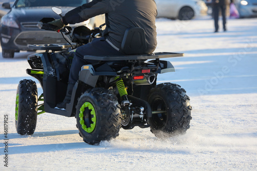 The ATV rides in the snow