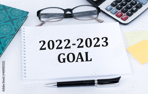 GOAL text with 2023, 2022 on notepad. Risk Management, Resolution, strategy, solution, New Year New You and happy holiday concepts