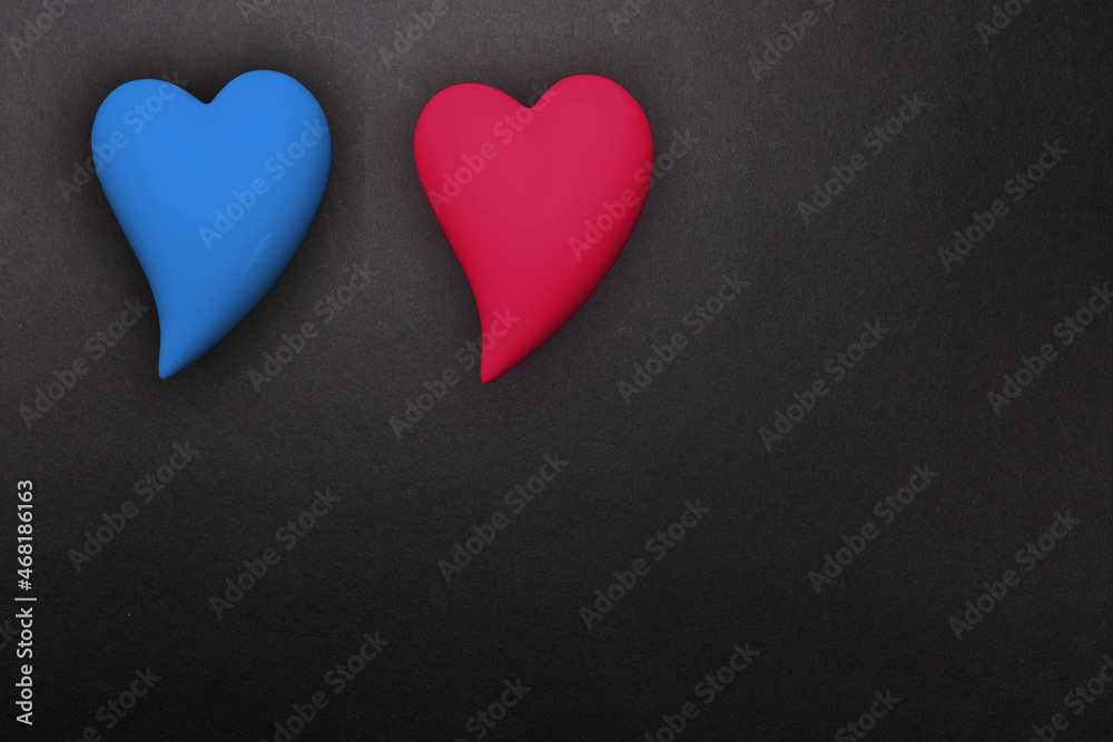 Obraz premium two hearts red and blue on a black background, a symbol of love, the basis for the designer, wallpaper, gift wrapping, valentine's day background