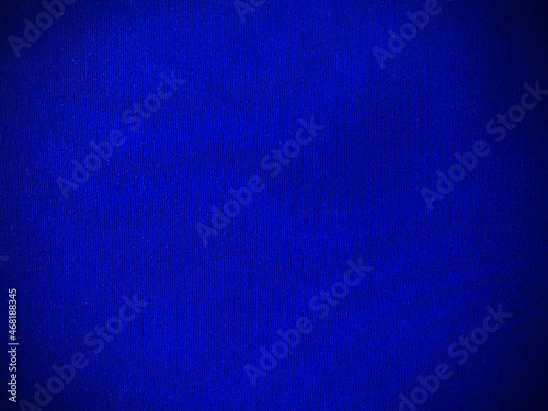 Blue velvet fabric texture used as background. Empty blue fabric background of soft and smooth textile material. There is space for text.