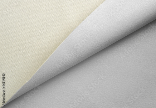 white artificial leather with waves and folds on PVC base