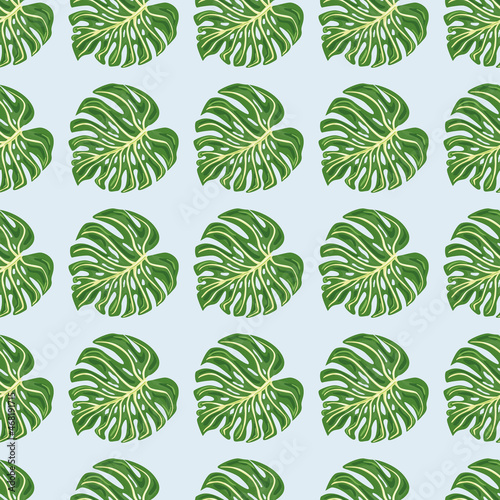 Modern tropical seamless pattern with monstera leaves on blue background.