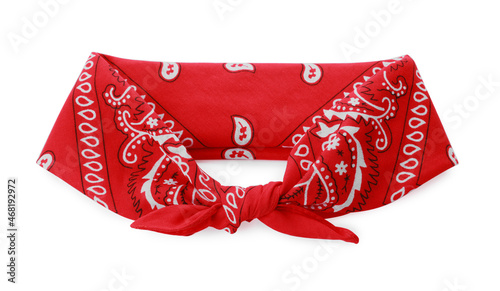 Fotografiet Tied red bandana with paisley pattern isolated on white