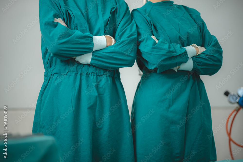 surgeon doctor team working in operation room at hospital, medical health clinic with specialist surgeon doctor team working in operation room at hospital, medical health clinic with specialist