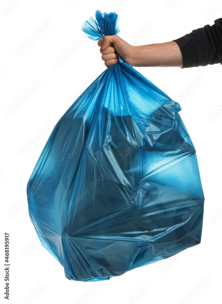 Man holding trash bag filled with garbage on white background, closeup Man holding trash bag filled with garbage on white background, closeup
