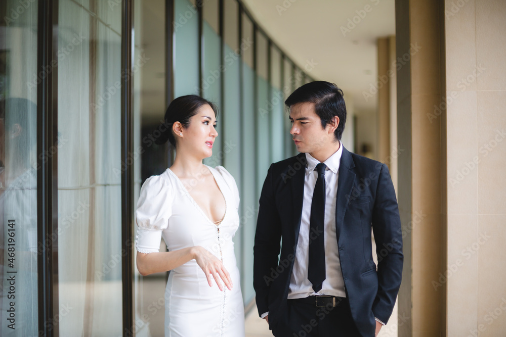 professional business partner person talking together, man and woman working in urban city professional business partner person talking together, man and woman working in urban city