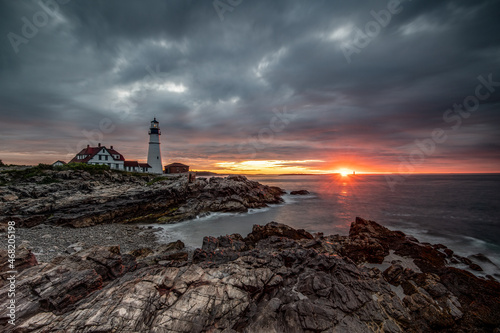 Dramatic sunrise over Portland Head Light in Maine 