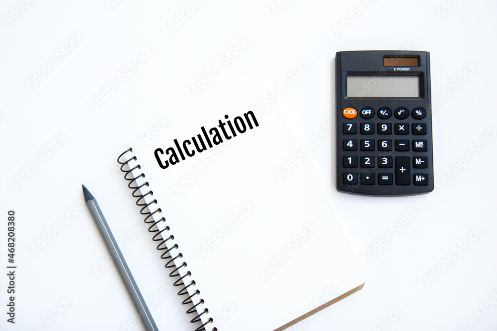 Calculator, notebook and pencil isolated on white background. Concept of family budget and calculation Calculator, notebook and pencil isolated on white background. Concept of family budget and calculation