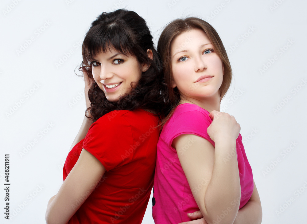 Happy friends hugging each other.Teenage girl using smart phone.Selfie.Girl have fun . Happy friends hugging each other.Teenage girl using smart phone.Selfie.Girl have fun .
