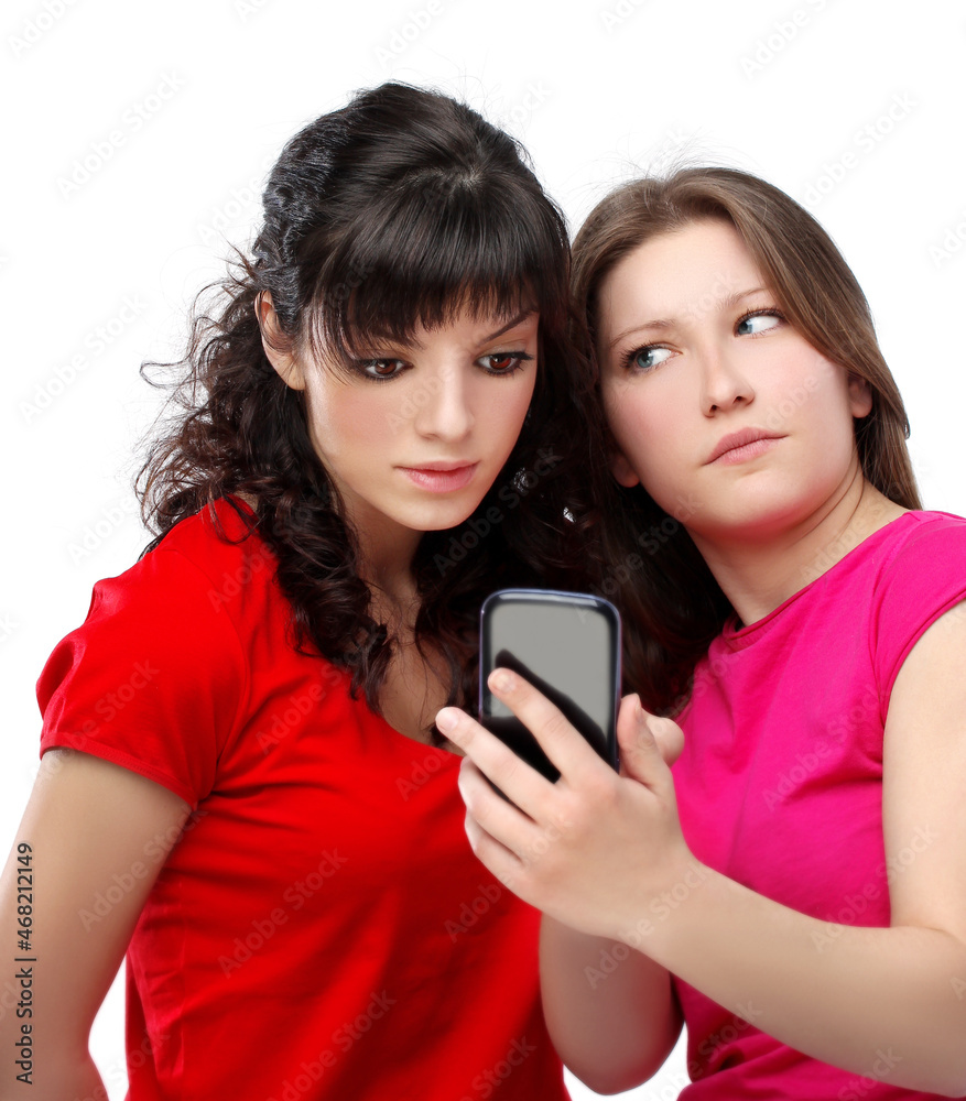 Happy friends hugging each other.Teenage girl using smart phone.Selfie.Girl have fun . Happy friends hugging each other.Teenage girl using smart phone.Selfie.Girl have fun .