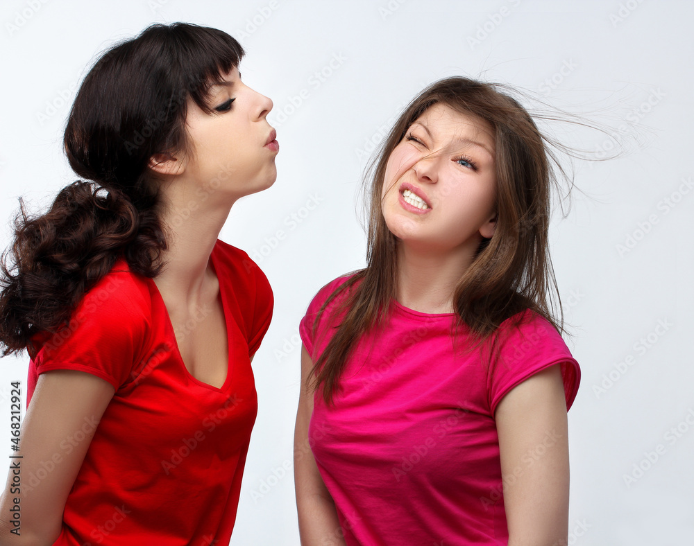 Angry girlfriend,Gossip.Beauty portrait of a young girls. Angry girlfriend,Gossip.Beauty portrait of a young girls.