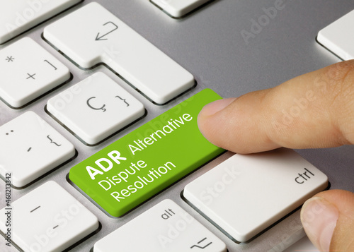 ADR Alternative Dispute Resolution - Inscription on Green Keyboard Key. photo