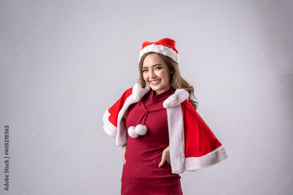 Portrait of beautiful female model wear santa hat,Christmas or New Year sale concept. Portrait of beautiful female model wear santa hat,Christmas or New Year sale concept.