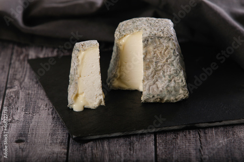 Fresh Valencay cheese and a slice for dessert