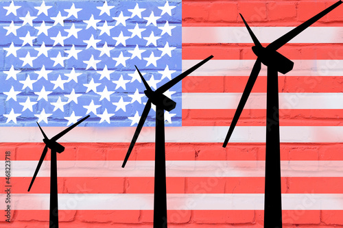 wind generator on blue sky background. electricity production. place for text, at sunset