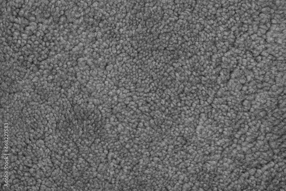 Texture of a soft gray carpet. Background.