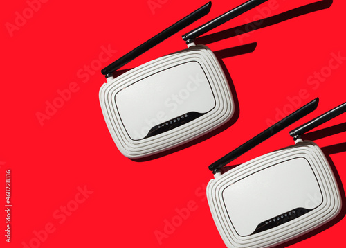 Obraz na płótnie modems for internet access on a red background