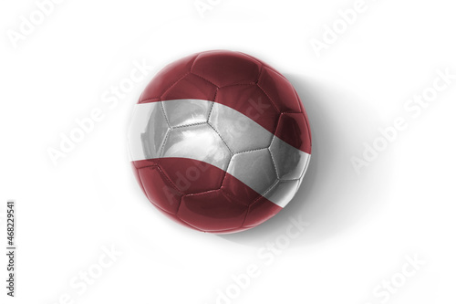 realistic football ball with national flag of latvia on the white background