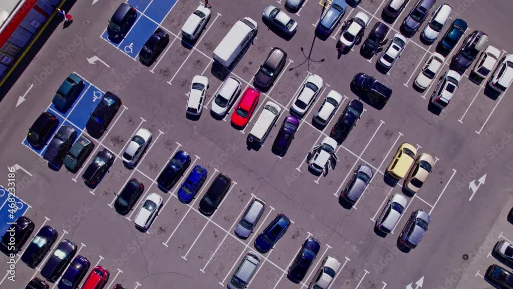 Aerial top view from drone of parking lot cars of the business center Aerial top view from drone of parking lot cars of the business center