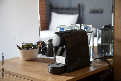 Coffee machine with coffee/ tea supplies in a hotel room