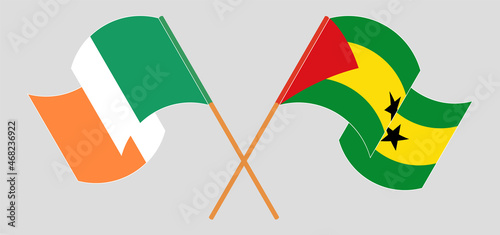 Crossed and waving flags of Ireland and Sao Tome and Principe