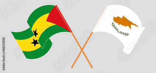 Crossed and waving flags of Sao Tome and Principe and Cyprus
