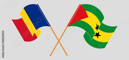 Crossed and waving flags of Romania and Sao Tome and Principe
