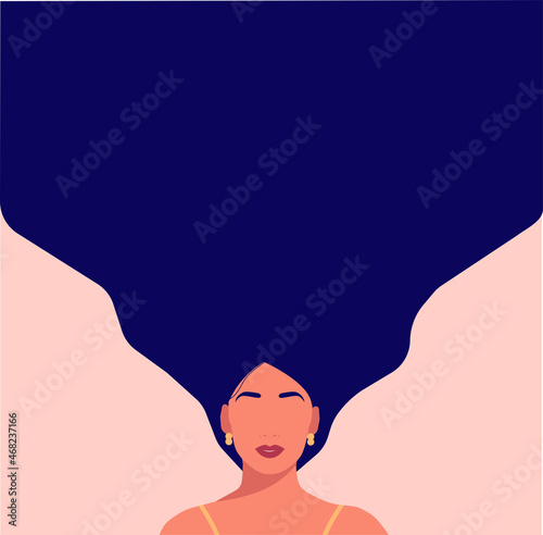 Portrait of a beautiful girl, thinking, reflecting. A young dreamy brunette with long hair. A feminine lady. Psychology of a woman.