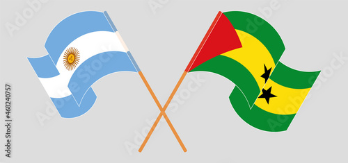 Crossed and waving flags of Argentina and Sao Tome and Principe