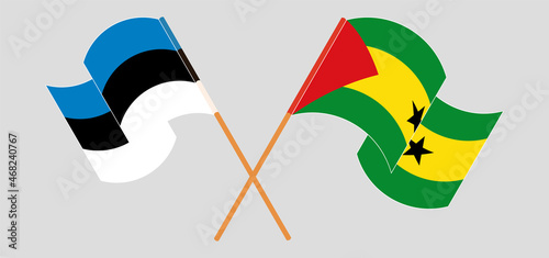 Crossed and waving flags of Estonia and Sao Tome and Principe