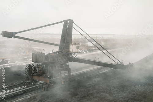 Bucket wheel excavator - a mining transport vehicle on a walking-rail track. Big overburden machine. Top view. photo