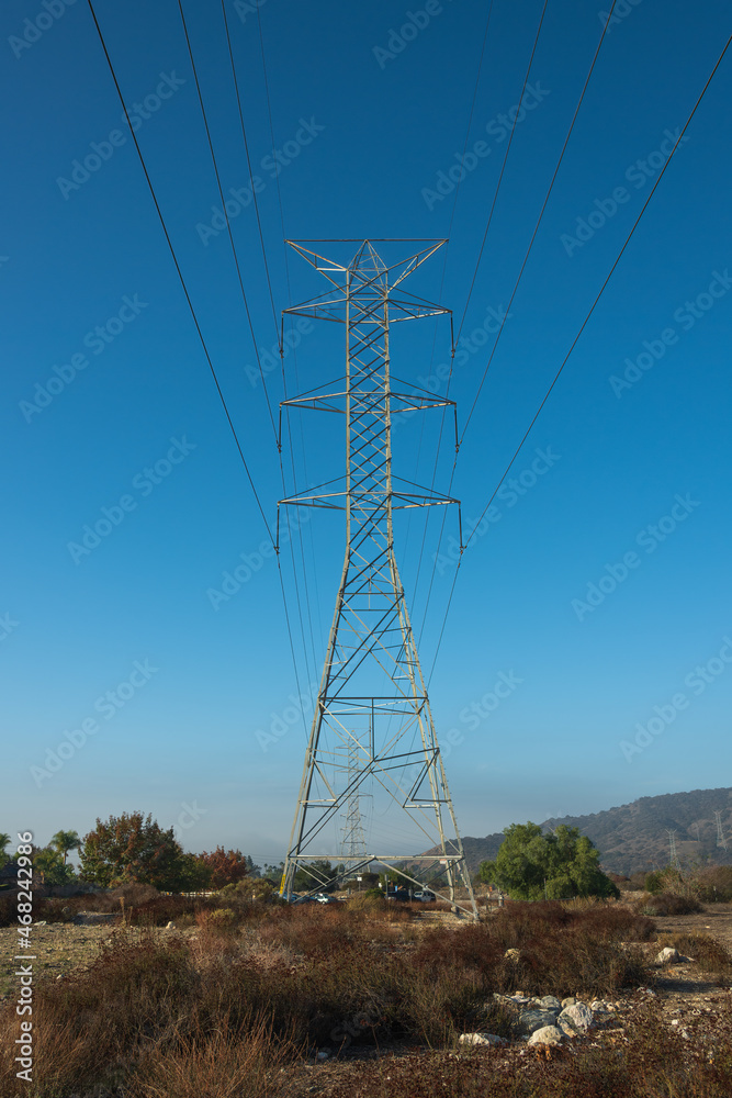 Steel Power Line Tower Under Blue Sky Vertical Steel Power Line Tower Under Blue Sky Vertical
