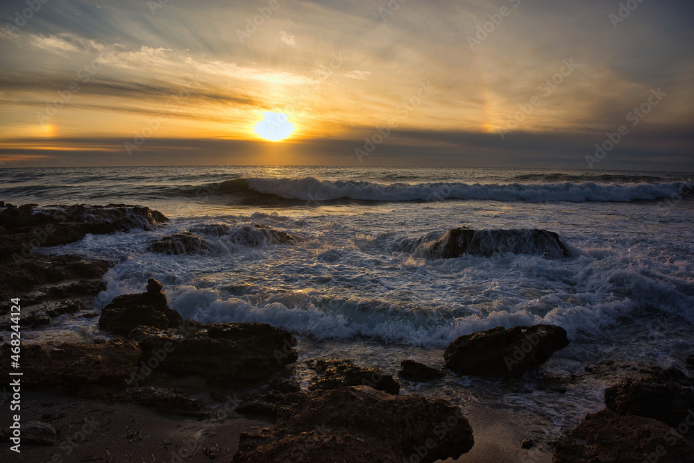 Sunrise with the rough sea on the Costa Azahar