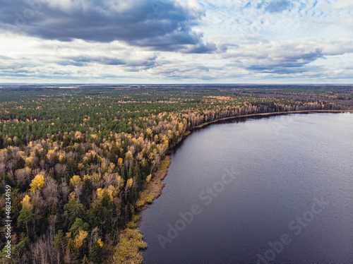 Kroman Lake in Nalibokskaya Pushcha under the stormy sky, Belarus. Drone aerial photo.