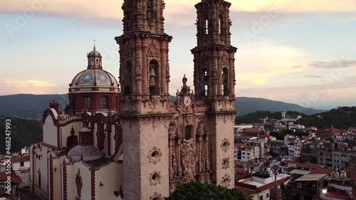 Sunset in Santa Prisca church in Taxco Mexico  photo